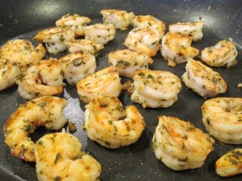 Boyfriend peeled fresh shrimp, seasoned it with salt, pepper, parsley, and garlic while it sizzled on the pan.