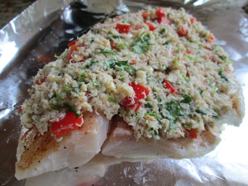 Seasoned the tilapia with salt, pepper, paprika, and lime juice. Layered the yummy crab on top!